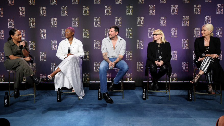 panelists on stage at film festival