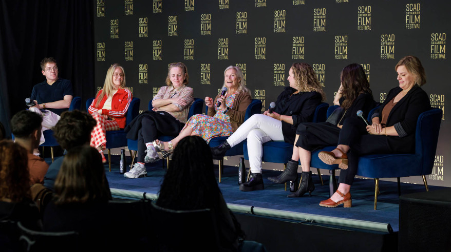panelists on stage at film festival