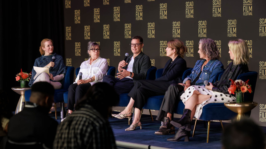panelists on stage at film festival