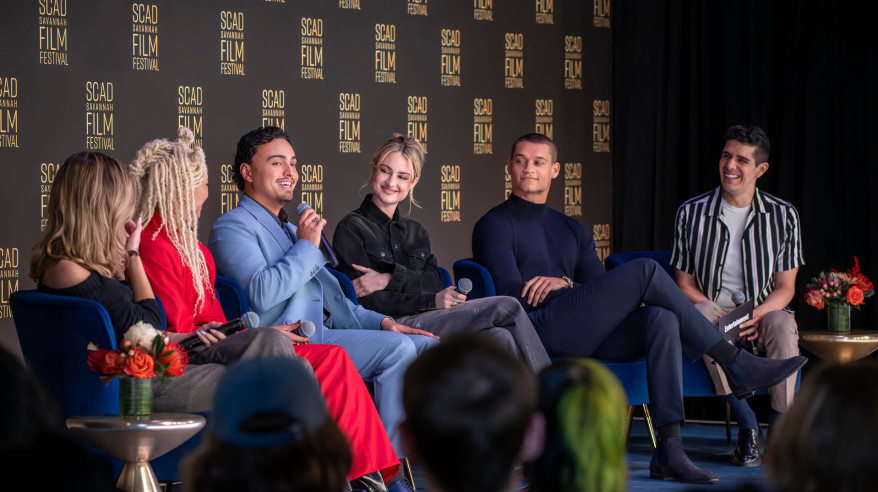 panelists on stage at film festival