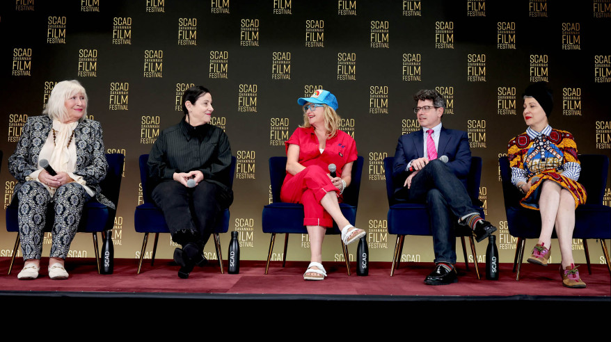 panelists on stage at film festival